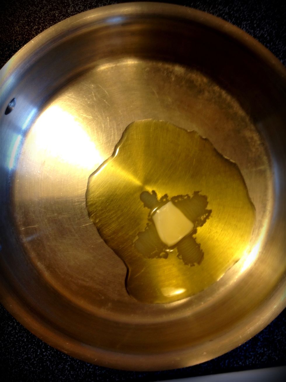 Heat olive oil and butter over medium high heat.