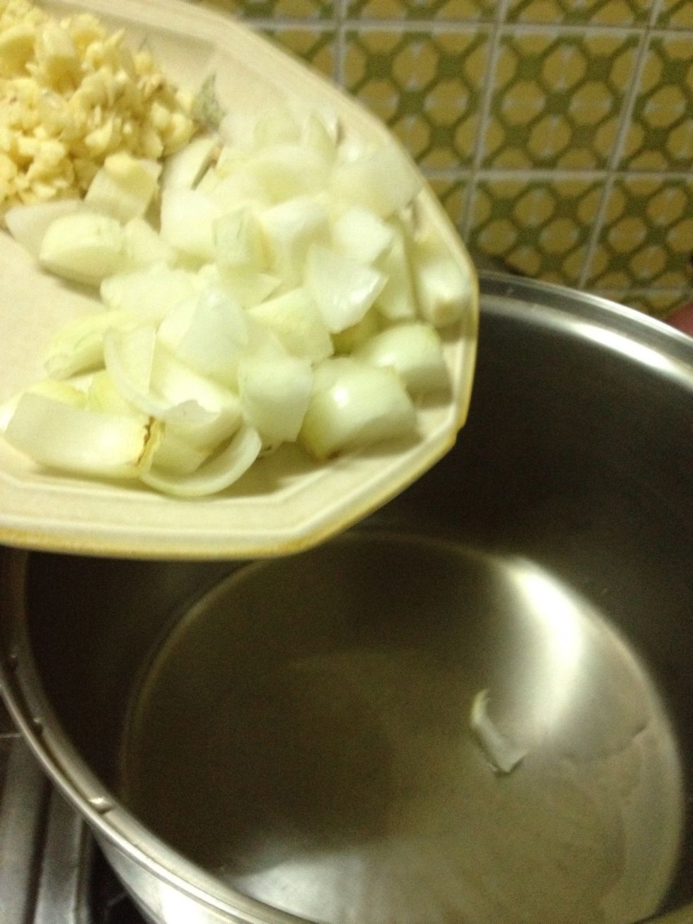 Heat olive oil in a big pot and add the onions first.