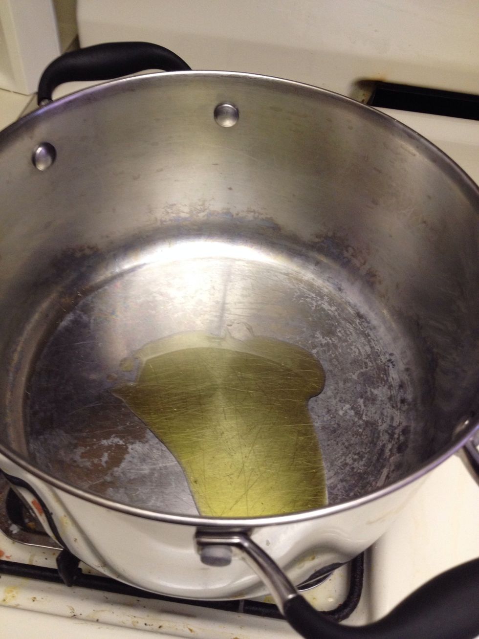 Heat olive oil in large Dutch oven.