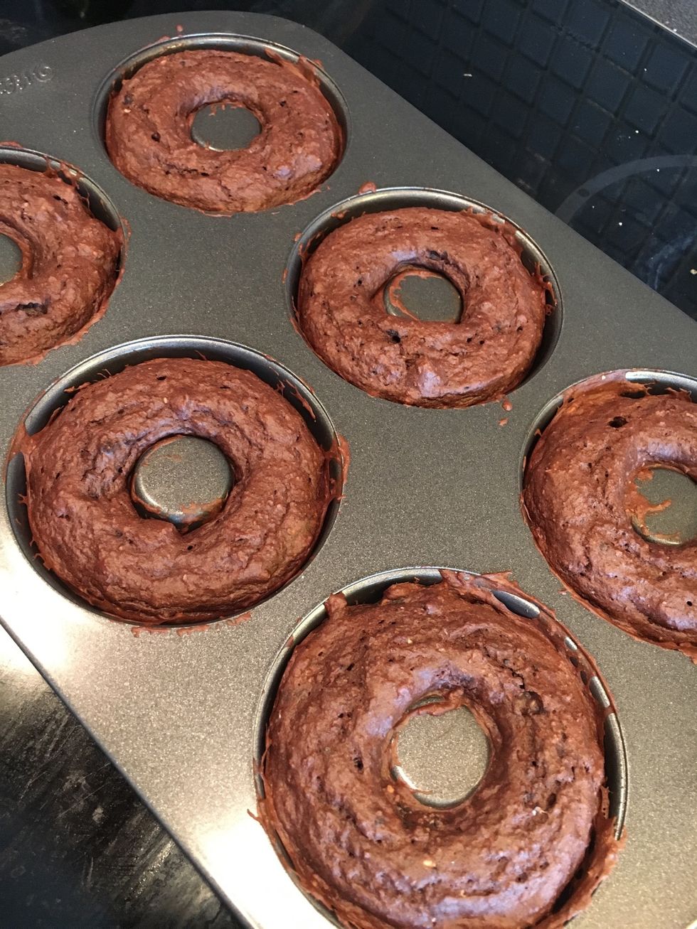 Heat on 175 degrees celcius for 10-12 mins (or until you can put a toothpick into them and no dough sticks to it). Let them cool while you make the frosting (next step).