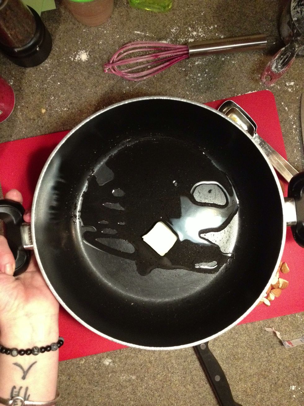 Heat one tbsp unsalted butter and a couple tablespoons of olive oil in a pot over medium heat.