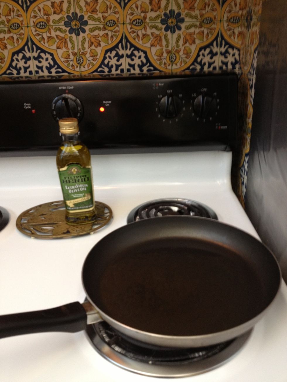 Heat pan with olive oil on medium heat