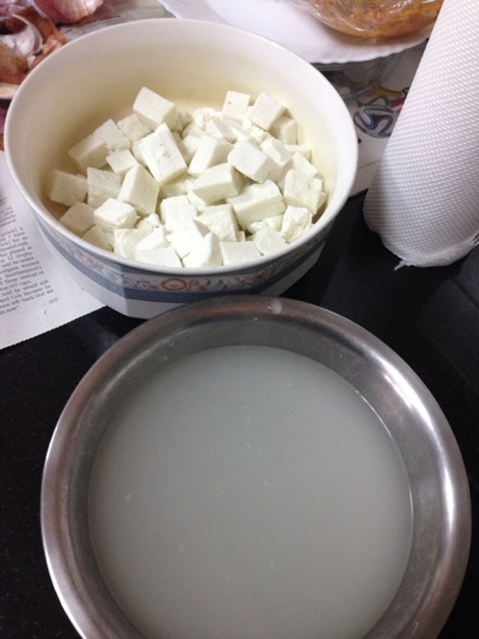 Heat paneer and 2cups of hot water in microwave. Separate water and paneer (water will be used for curry)