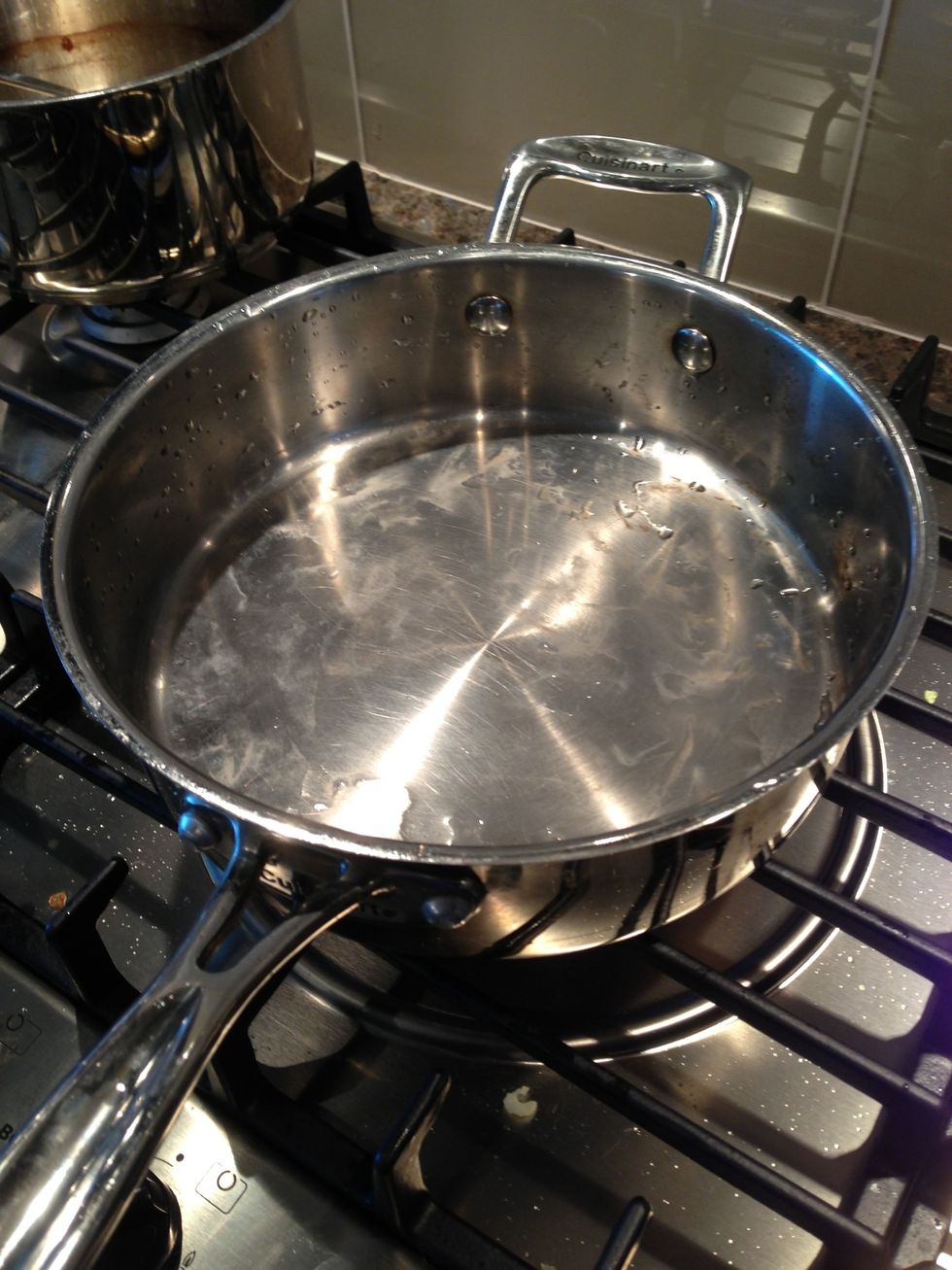 Heat saut\u00e9 pan on high heat