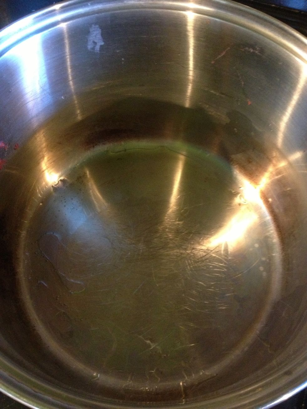 Heat some oil in a large pan.