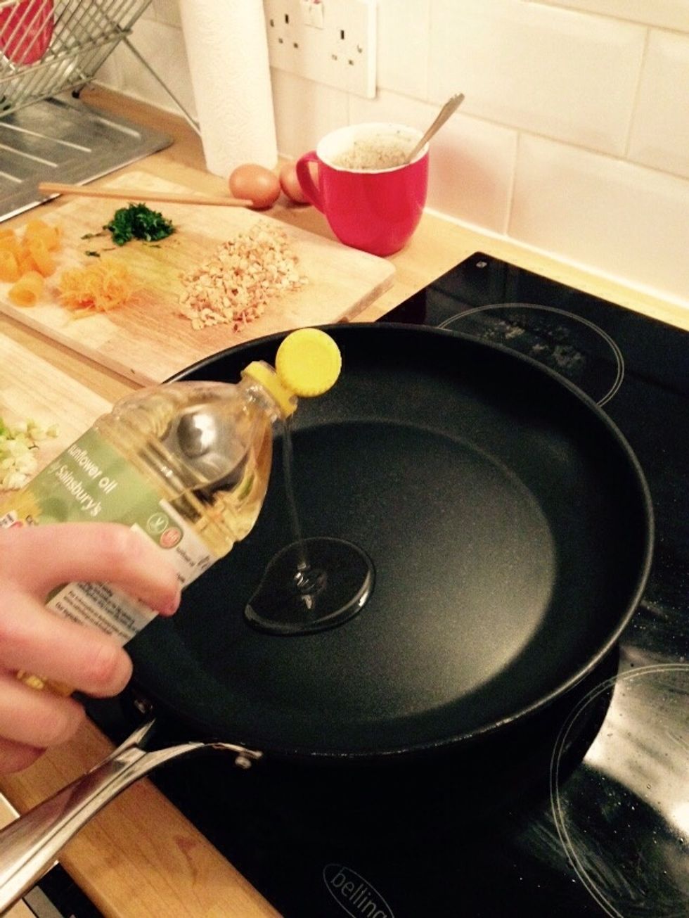 Heat some oil in a large saucepan or even a wok.