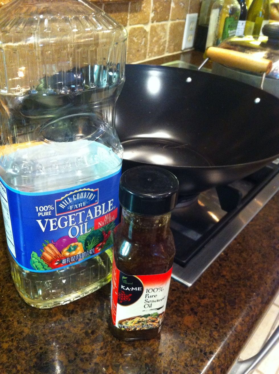 Heat some vegetable oil and a little sesame seed oil in a wok