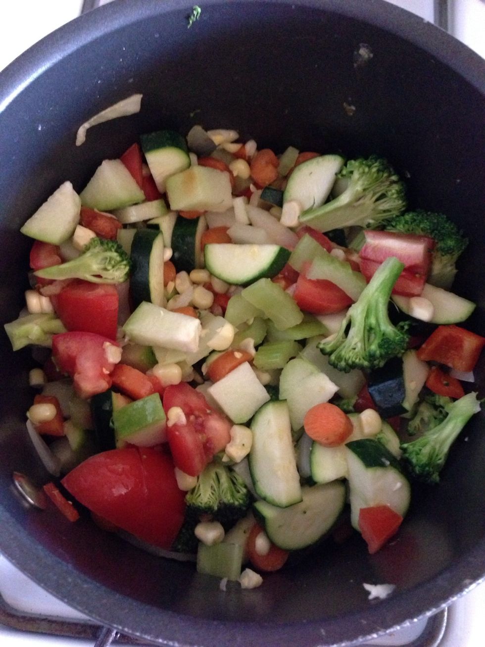Heat the 3 tbs of oil. Chop the vegetables and saut\u00e9e them for about 10 minutes. I used a small pot and so the veggies filled about half the pot.
