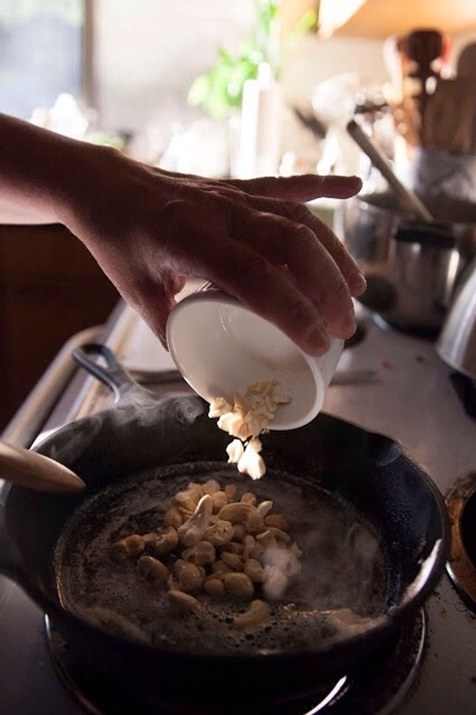 Heat the 4 tsp of butter or ghee in a skillet, when the butter is hot add in the cashews. Fry them until they are nice and golden toasted. Set them aside.
