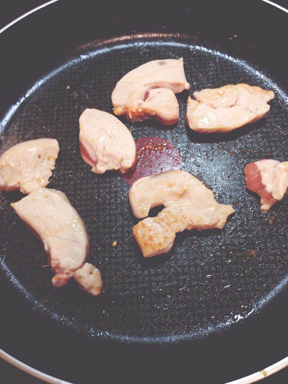 Heat the chicken in a pan with fry light until golden (cooked through)
