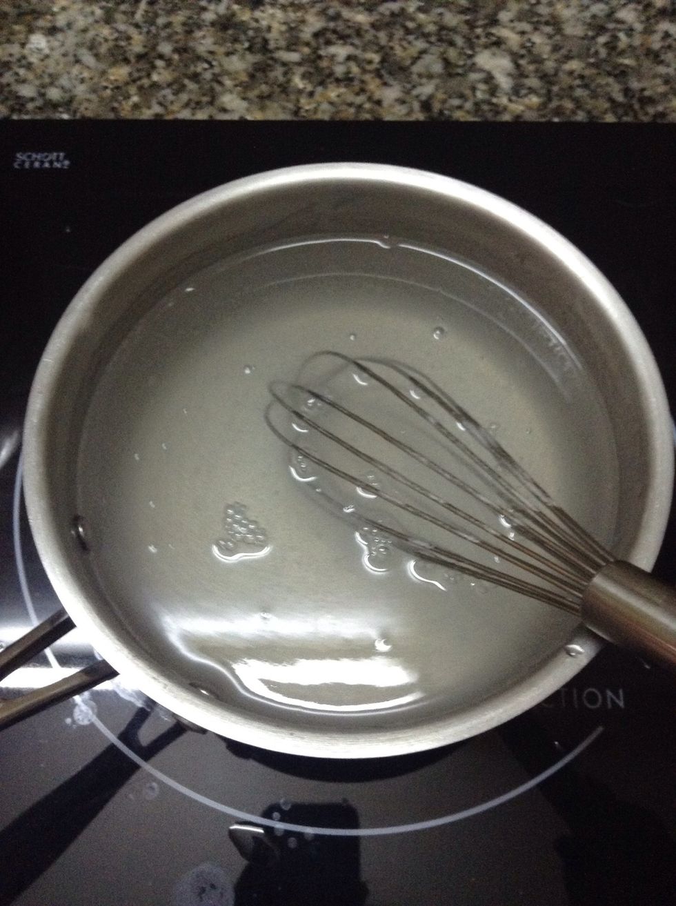 Heat the coconut water in low heat and add jelly powder, matcha, sugar, stir throughly until the powder completely dissolve.