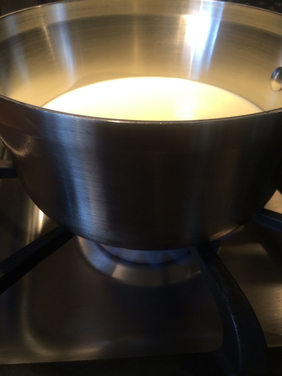 Heat the cream and half and half.