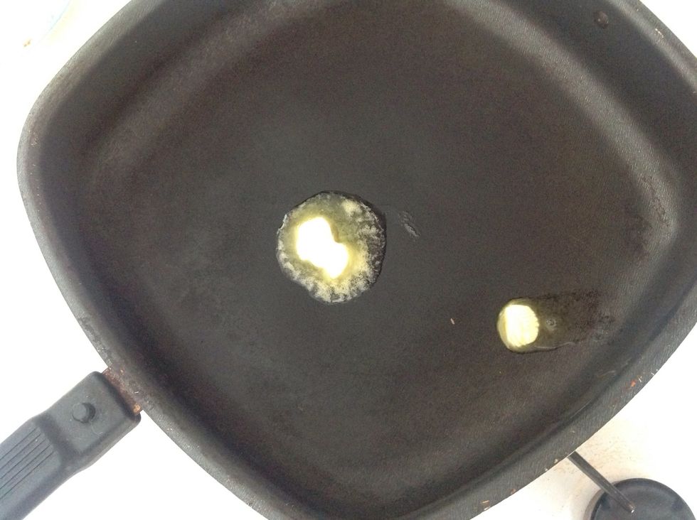 Heat the frying pan well and add a knob of butter.