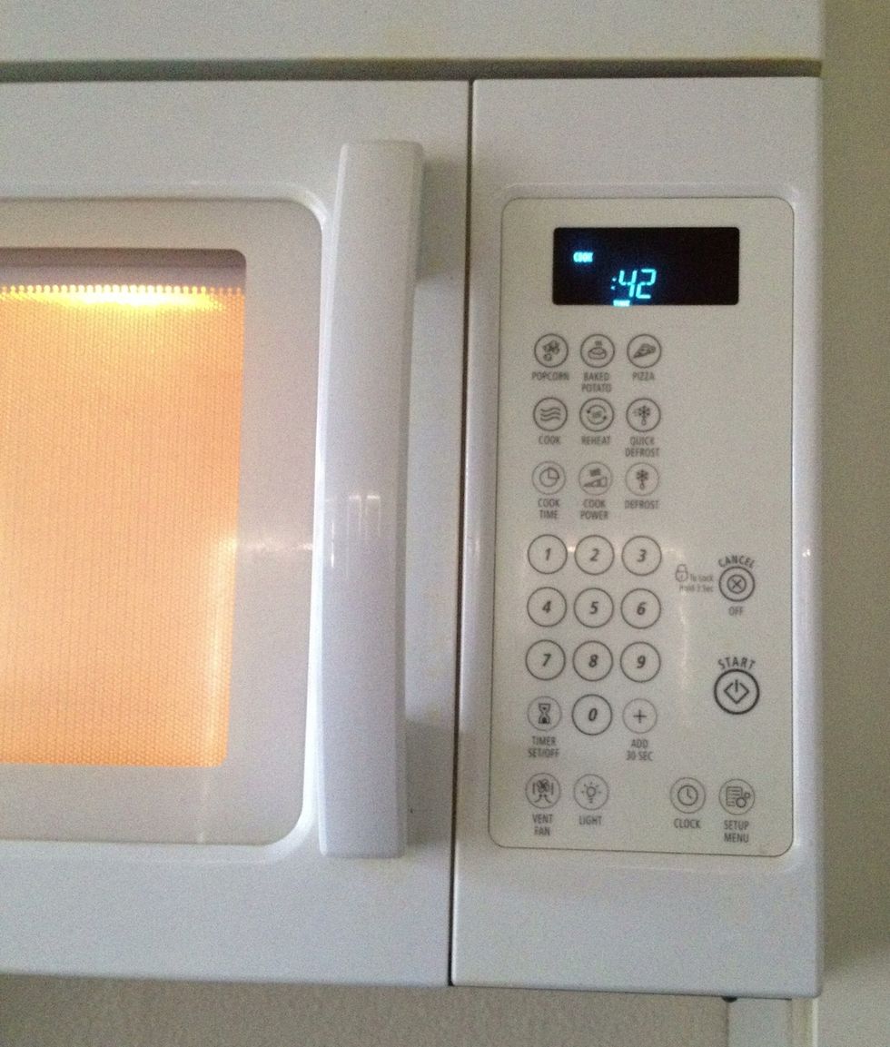 Heat the jar of milk in the microwave ... I usually set it to 50 seconds