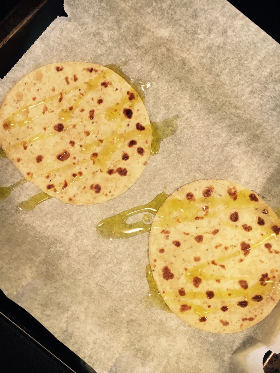 Heat the lompe/wraps for 2-3 mins on 225 degrees celcius without topping. With a drizzle of olive oil.