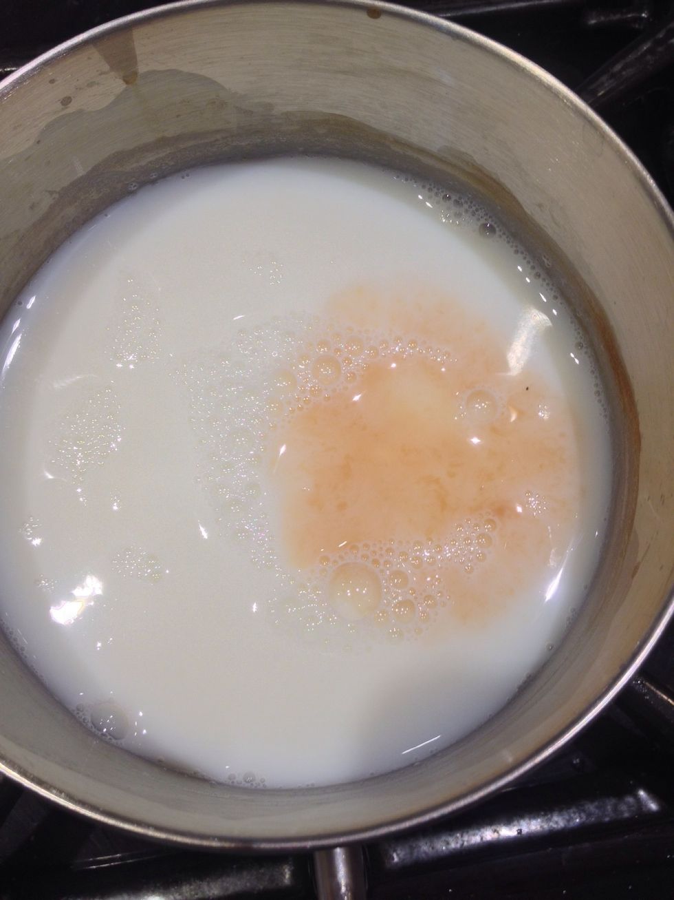 Heat the milk and vanilla extract in the sauce pan on high, watching closely to make sure the milk doesn't scald. You're watching for the milk to begin to bubble.