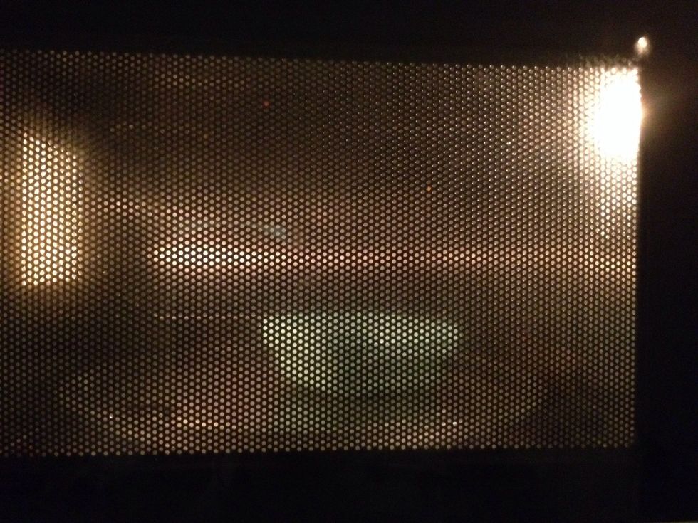 Heat the milk in a microwave until lukewarm
