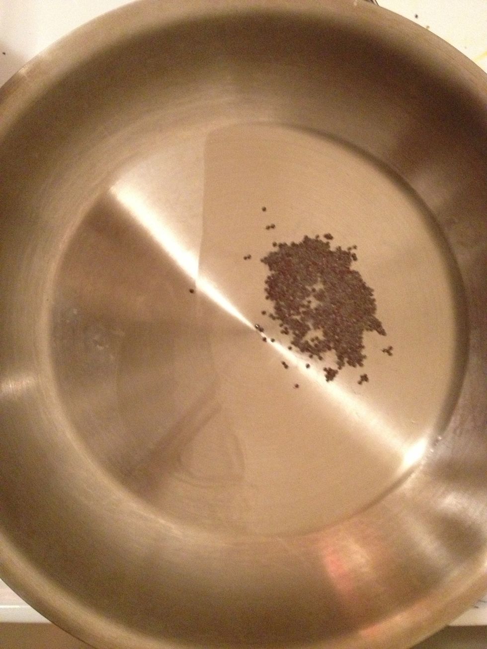 Heat the oil and add a teaspoon of mustard seeds,they will make a popping sound when they are ready..add the chopped onion and wait till it browns!