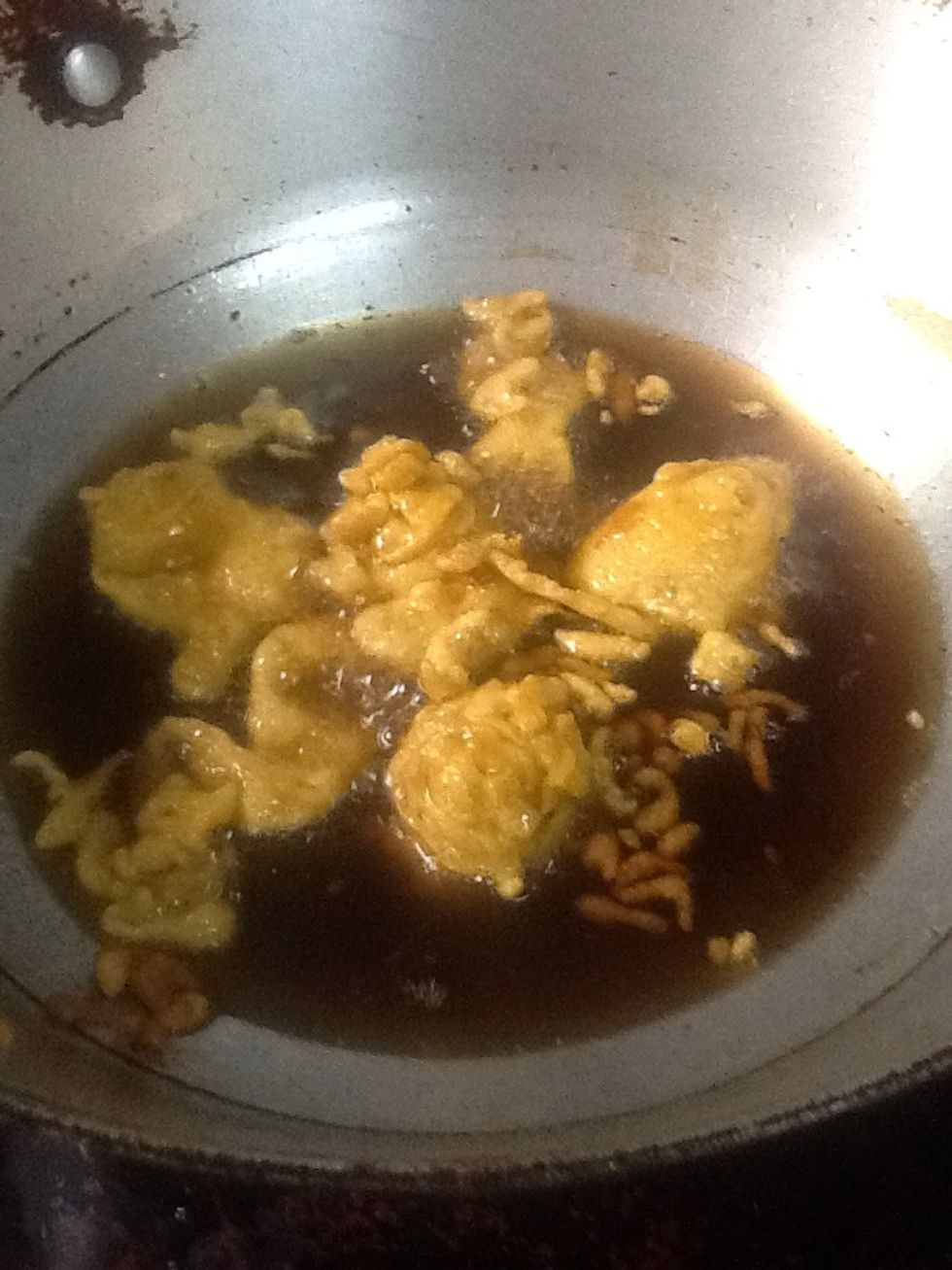 Heat the oil and drop spoonfuls of the batter In the heated oil. Deep fry till the balls are crisp and golden brown. (Remember : cook on medium heat) . Take them out and side aside to cool.