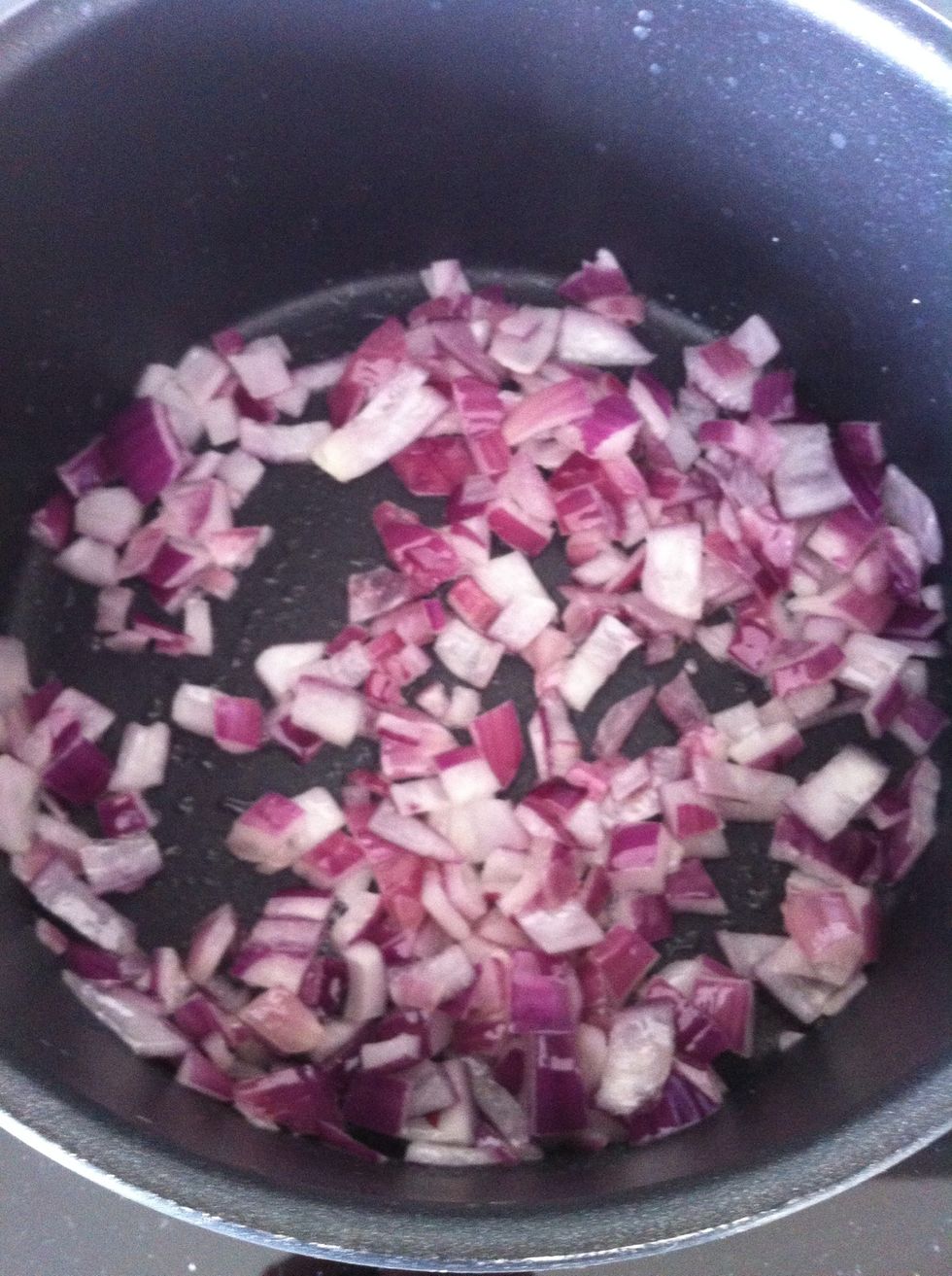 Heat the oil and gently fry the onion on medium heat.