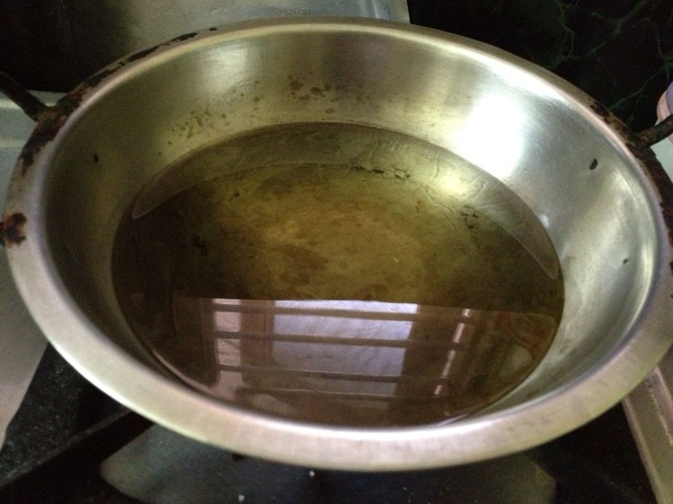 Heat the oil for deep fry of onions