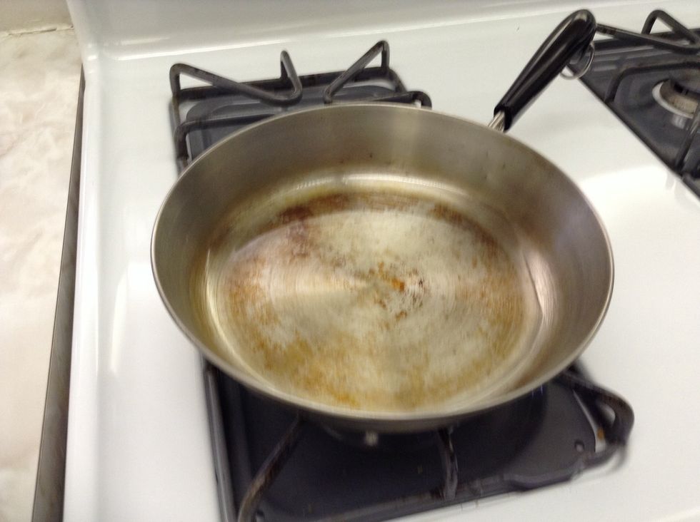 Heat the oil in a 12-inch nonstick skillet over medium heat until just smoking. Add two pieces of chicken and cook until golden.