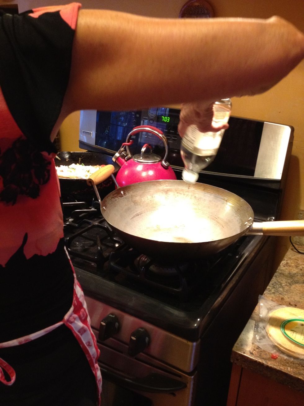 Heat the oil - tonight Connie used a combination of grapeseed and safflower oil but canola or another vegetable oil is fine too.