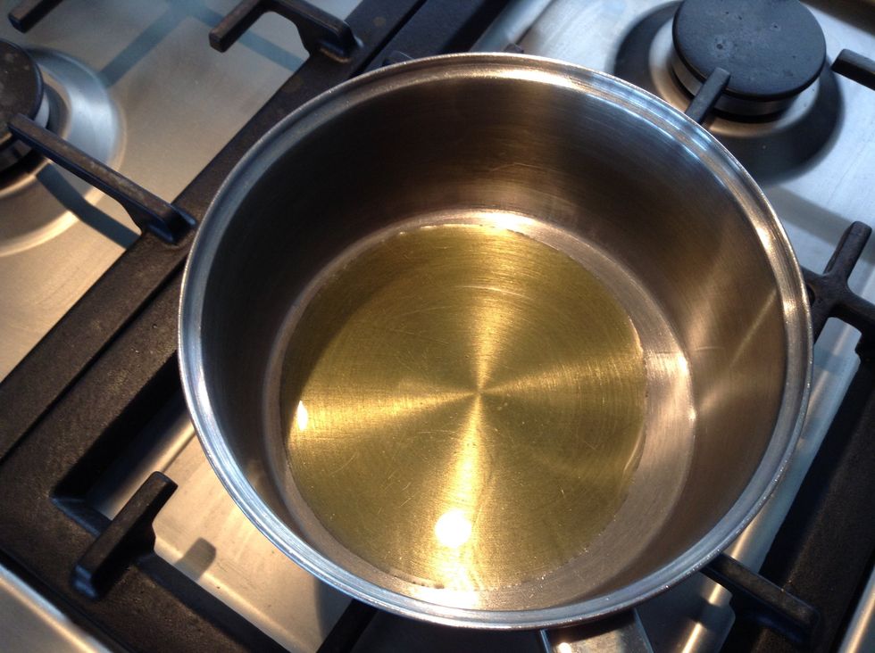 Heat the olive oil in a deep saucepan.