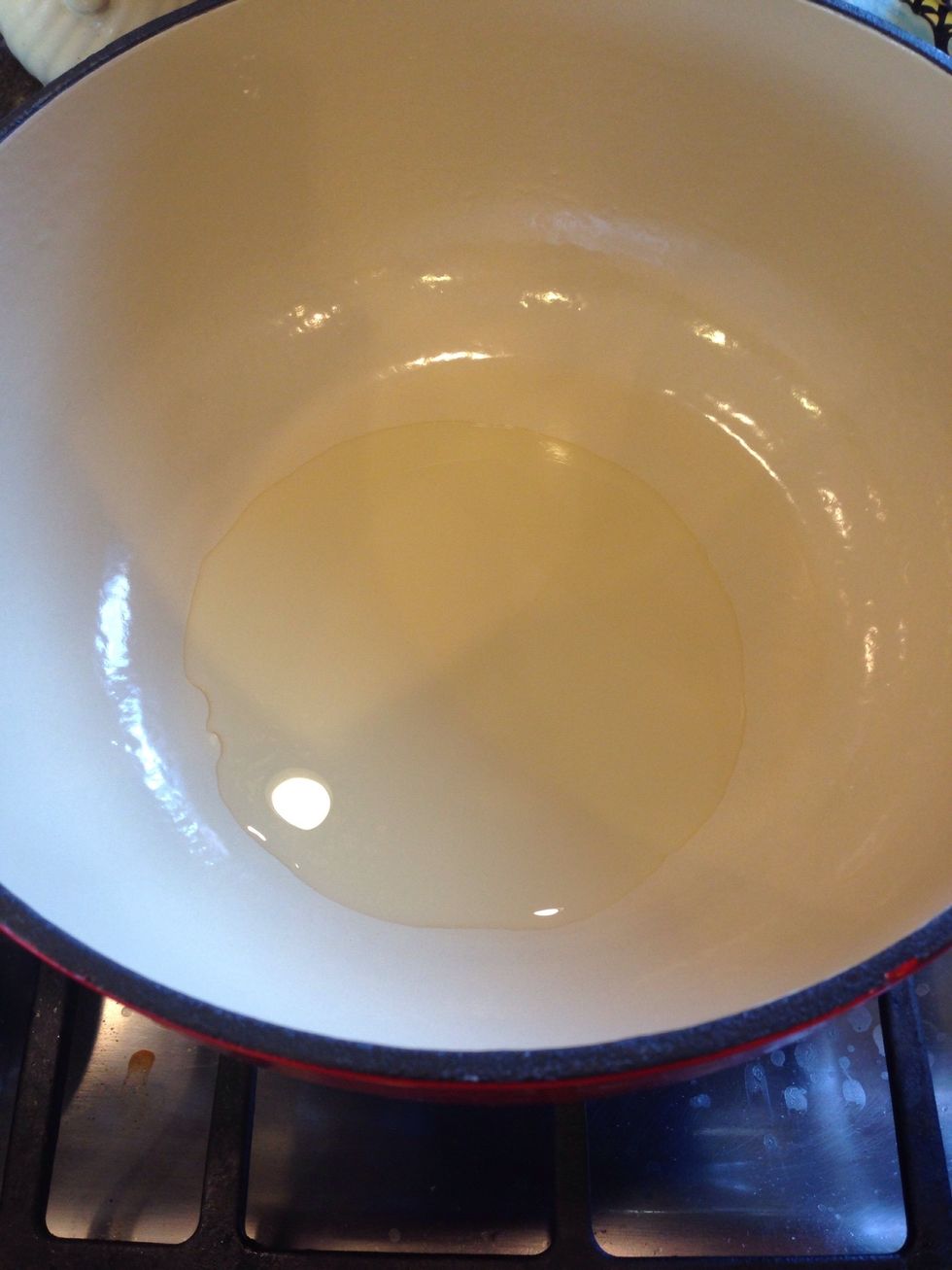 Heat the olive oil in a Dutch oven or deep pan.