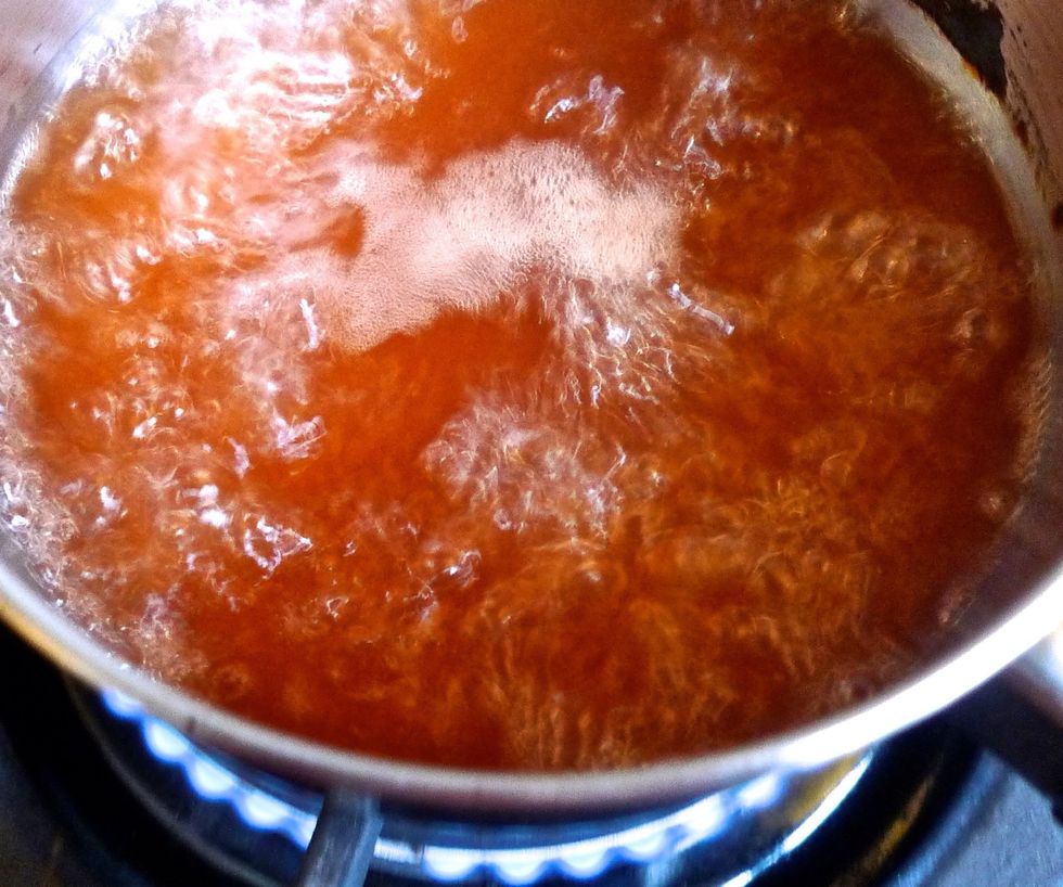Heat the pan over medium heat until it comes to a boil. Once the sauce has come to a boil, take it off the heat.