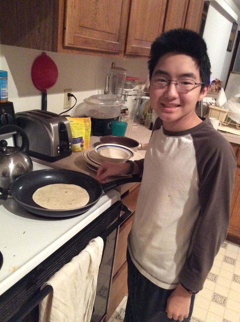 Heat the pan to Medium heat and put the Tortilla on the pan.