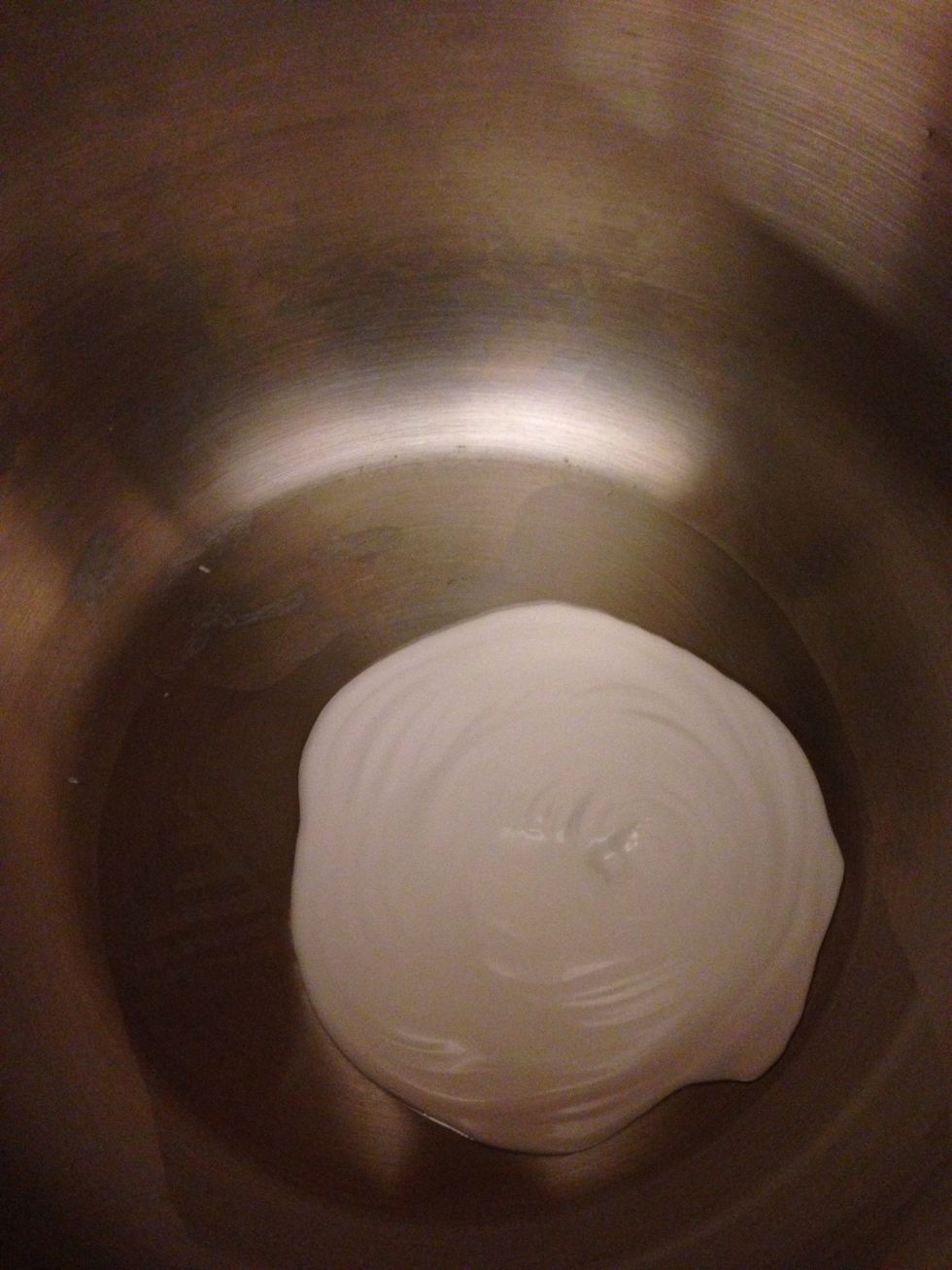 Heat the sauce pan at medium and add the coconut milk half of the recipe. If you did not shake the box like I mentioned, you will get the creamy part of the milk like so.