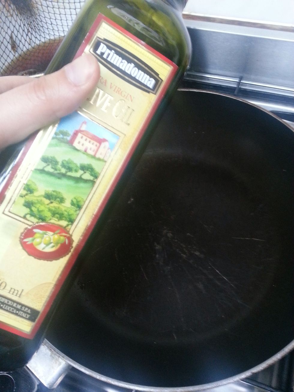 Heat the saucepan on low/med heat and add olive oil