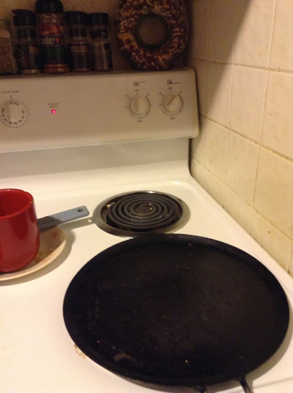 Heat the skillet at medium low.