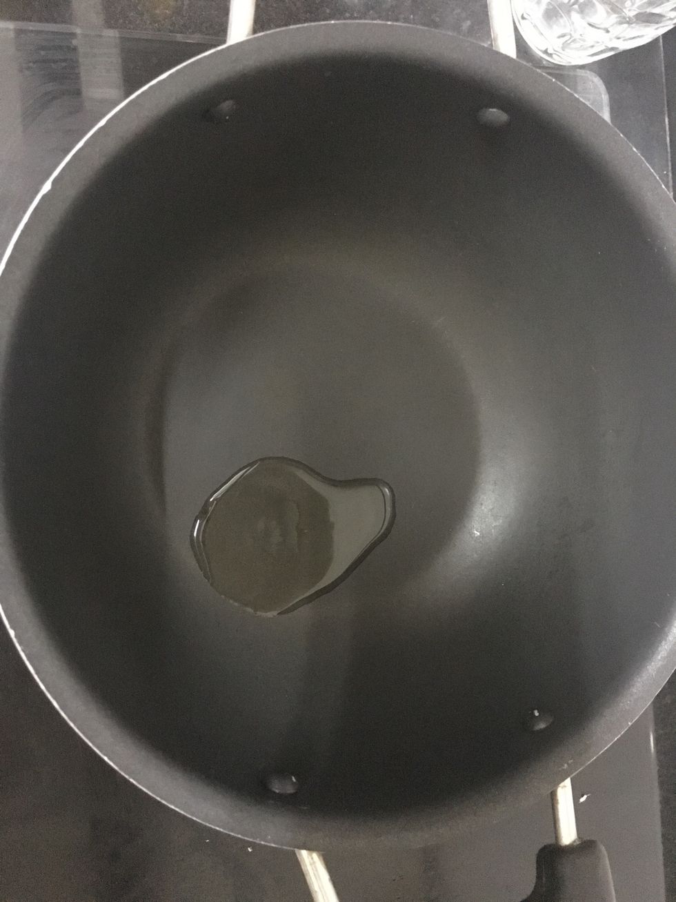 Heat the vessel and pour 1 tbsp of coconut oil