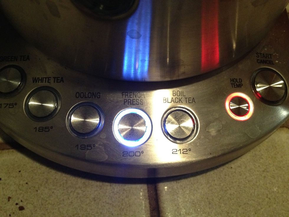 Heat the water to 200 degrees F. Our kettle has a hold feature, which is helpful for the easily distracted. Otherwise use water just off of boiling.