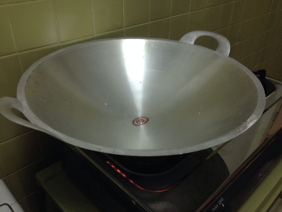 Heat the wok. Should be medium hot.