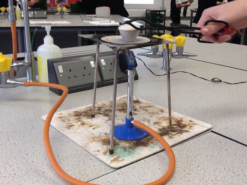 Heat until the magnesium has stopped reacting