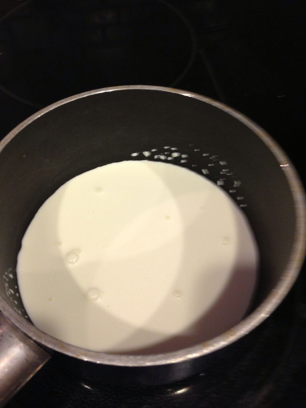 Heat up 1/2 cup of cream to a simmer.