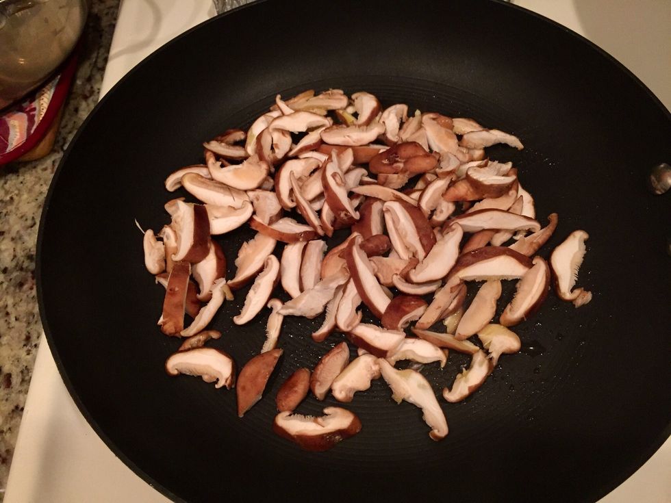 Heat up a skillet over medium high heat and add a tablespoon of olive oil. Add the mushrooms and cook for 3 minutes undisturbed. Season with salt and pepper.