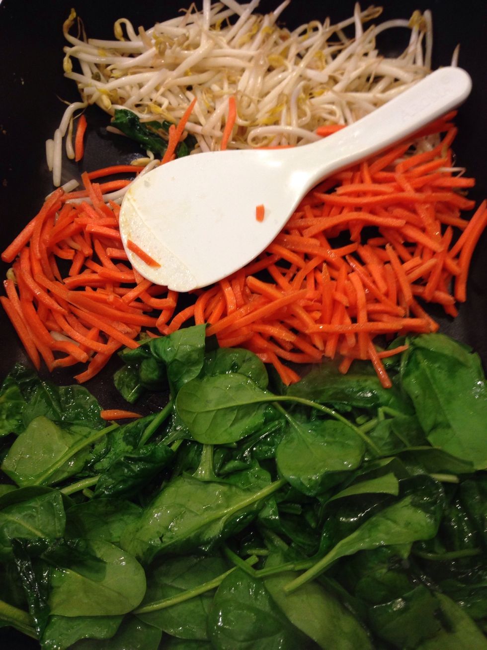 Heat up bean sprouts, carrot sticks & spinach.