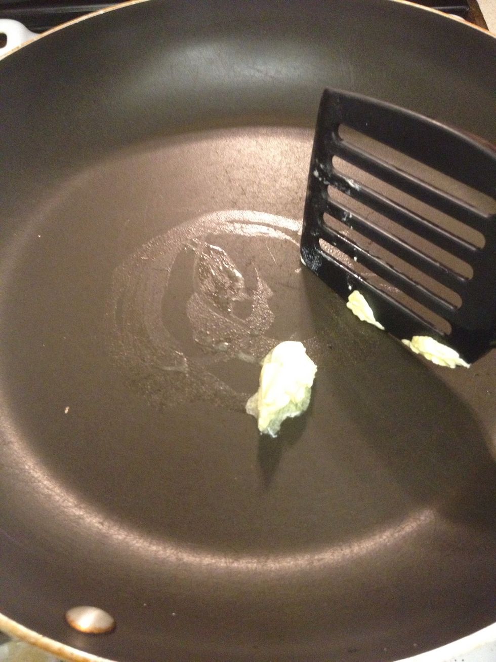 Heat up large pan. Keep it at a low heat, add butter