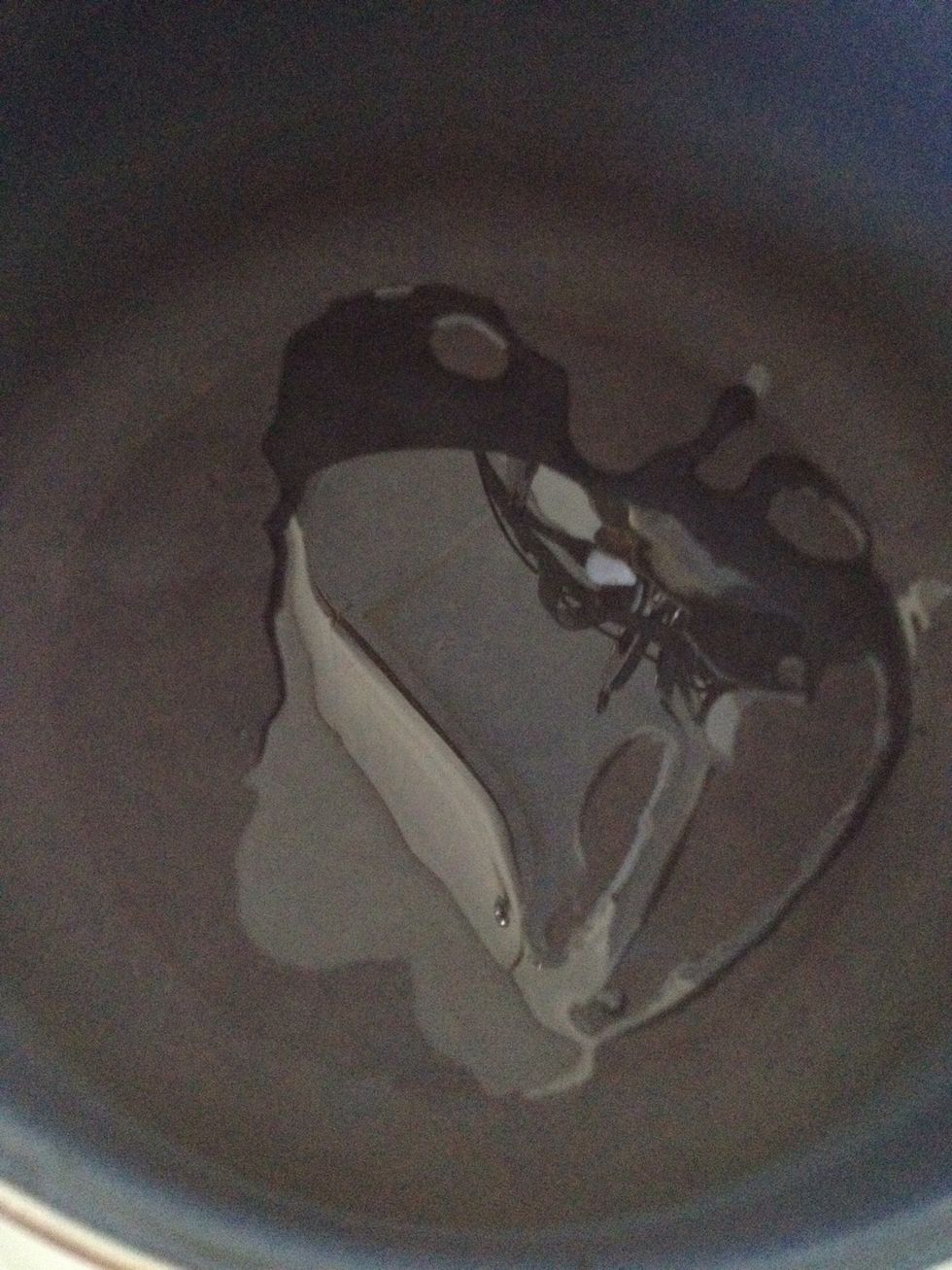 Heat up some oil in a large pot.