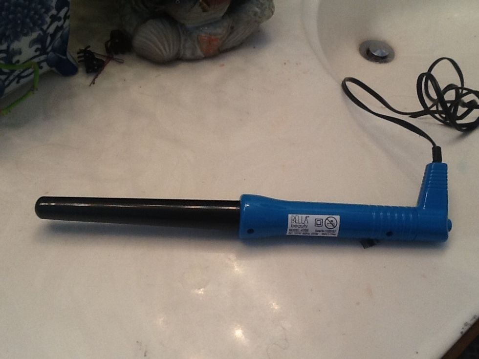 Heat up your curling wand. Im using the Bella Beauty 1 in to 3/4 in curling wand. I got this at tjmaxx