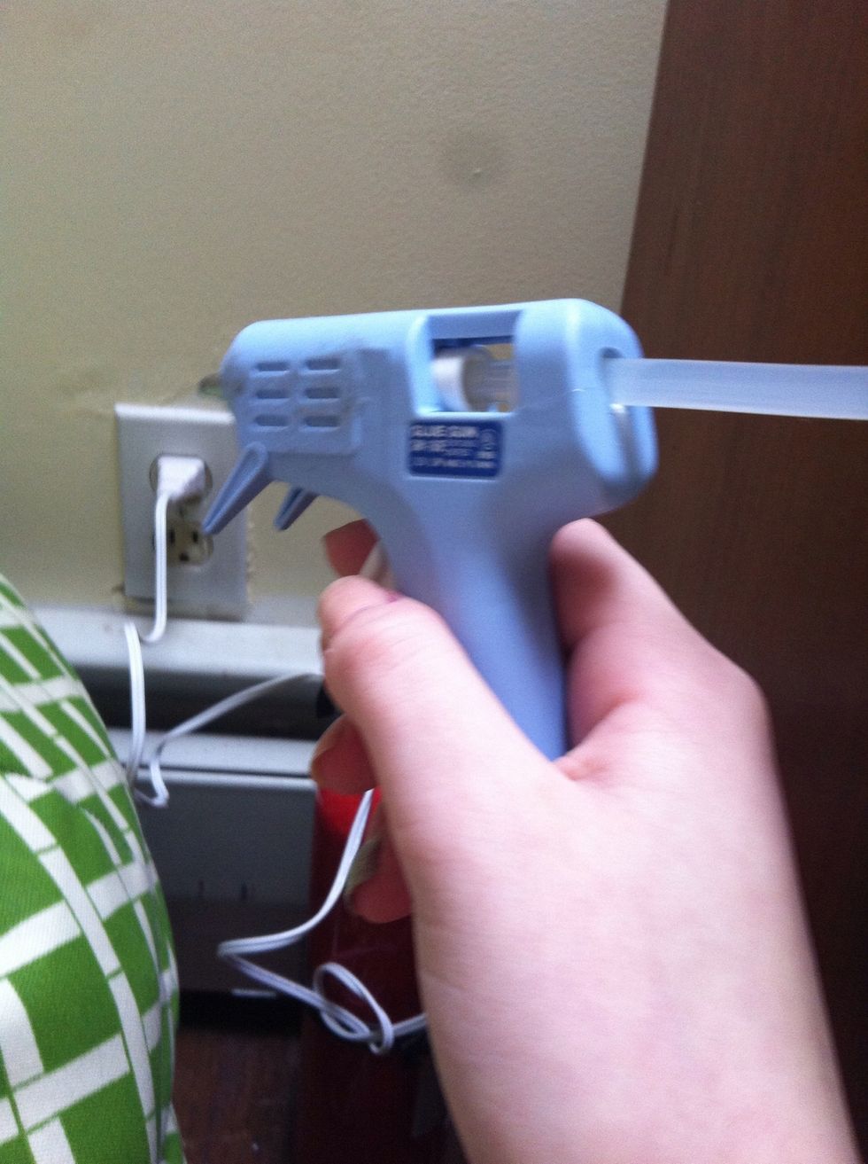 Heat up your glue gun to be nice and hot. *WARNING!! This craft is NOT for small children because they may get burned. If you are doing this craft for smaller kids, do this part and let them paint it.