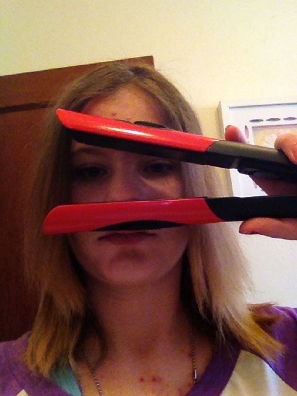 Heat up your straightner^.^ (But don't put it against your face._. Mine wasn't on. That's dangerous) and then you know, straighten away!