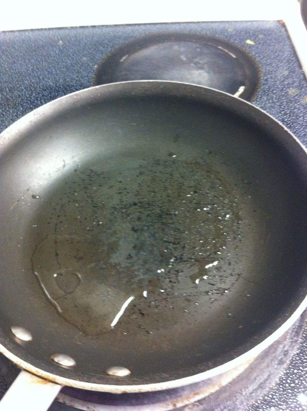 Heat Vegetable Oil in medium pan on medium heat (5-6).