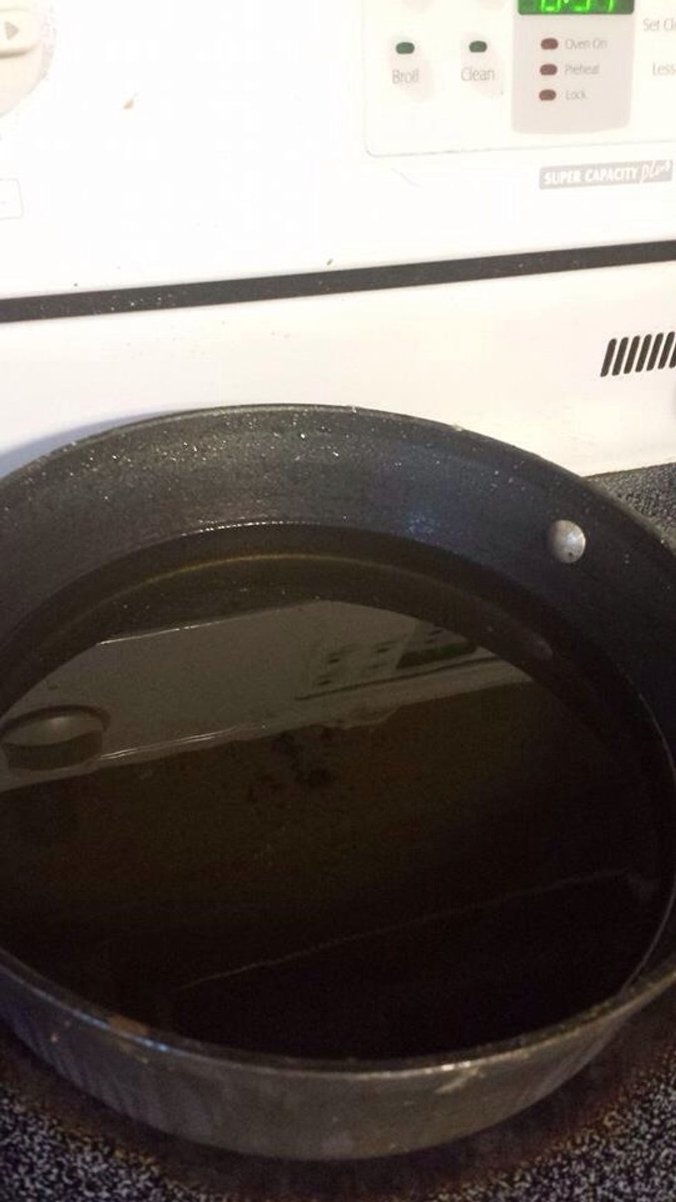 Heat vegetable oil on high, then lower to medium high.