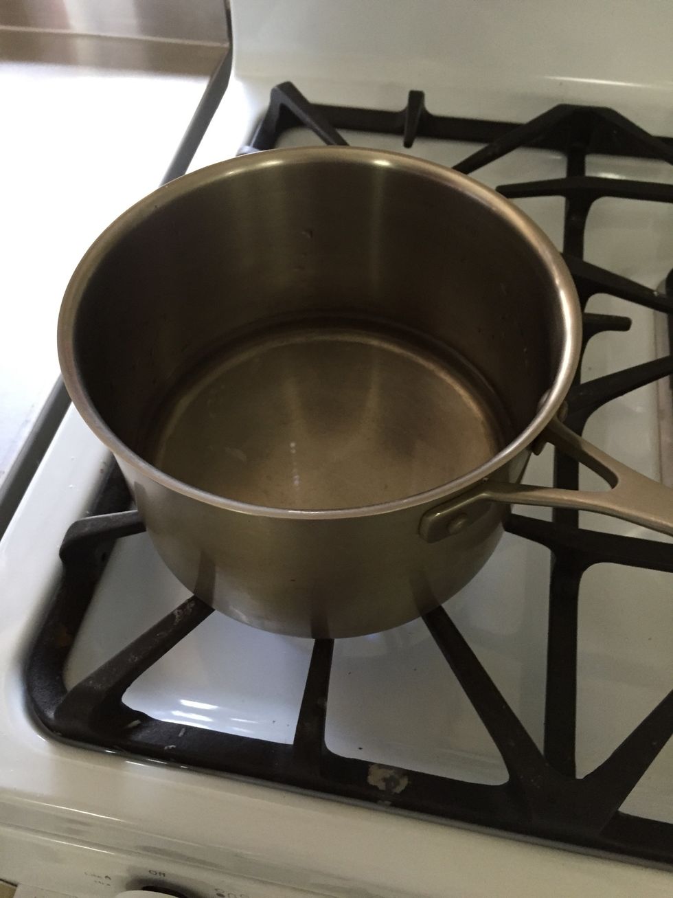 Heat water in a saucepan until simmering.