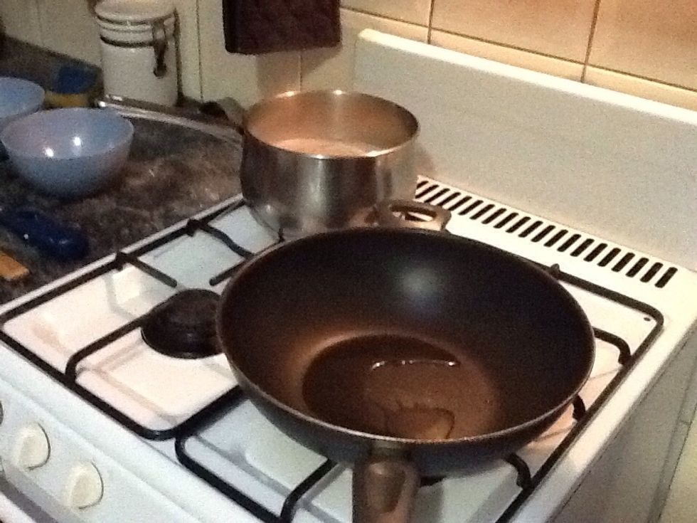 Heat wok with rice bran oil.